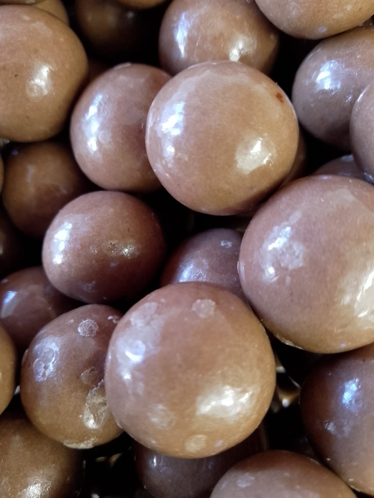 Hazelnuts covered in Milk Chocolate per 100g